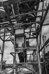 Dilapidated and abandoned industrial installation in monochrome
