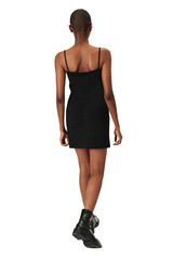Png woman in a black dress mockup rear view