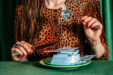 Person in leopard print eating money with fork and knife as satire