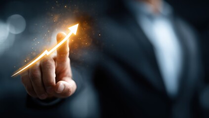 Hand pointing upwards, illustrating progress with a glowing arrow and bokeh background