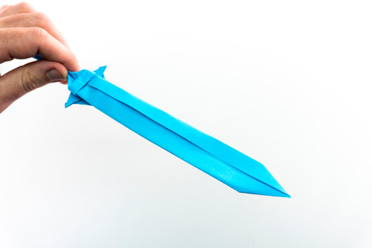 Paper sword. Origami knife. Paper weapons. Crafts.