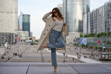 Elegant ballerina performing modern dance in urban environment © Moiseii Production