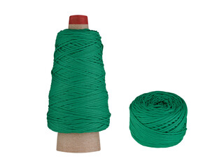 A Green thread set with a spool on a cardboard bobbin and a smaller ball, isolated on a white background. Perfect for sewing, knitting, or craft projects, this vibrant thread adds a cool, refreshing