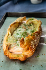 Puff pastry and salmon roll. Baked salmon in dough. Diet. Food concept