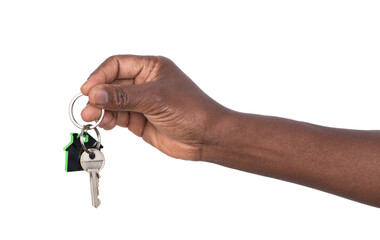 Hand holding a key to a house or an apartament isolated on white or transparent background