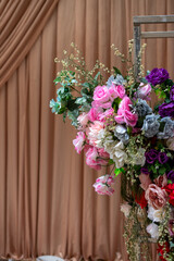Fototapeta premium Colorful artificial floral arrangement for event decor