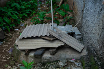 Old Corrugated Roofing Sheets Discarded on Urban Ground