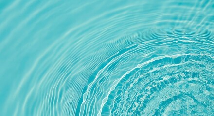 An inviting abstract background showcasing pristine, clear turquoise blue water with gentle, expanding ripples. The serene surface reflects natural light, creating captivating patterns and textures th