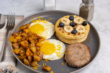 fried eggs along with waffles