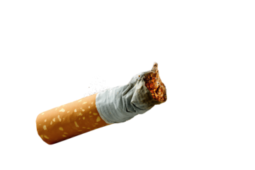 Extinguished cigarette butt with tan speckled filter and twisted gray paper, faint ember glow and scattered ash pieces, isolated on transparent background.
