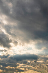 Vertical Dramatic dark storm rain clouds black sky background. Dark thunderstorm clouds rainny atmosphere. windstorm disasters climate. Dust ominous cloudscape storm disaster gloomy gray cloud sky
