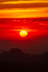 Vertical Horizon Golden sky sunrise dramatic beautiful landscape view. Dawn sky gold dusk time cloudscape with sunlight. Vertical Dramatic sunset golden red sky scenic landscape sunrise dawn heaven