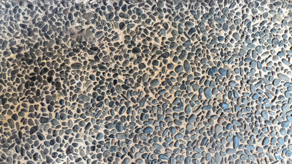 Textured Pebble Surface A Close-Up View of Small Stones and Gravel, Decorative Material