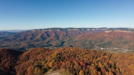 Mountains with autumn foliage and clear sky