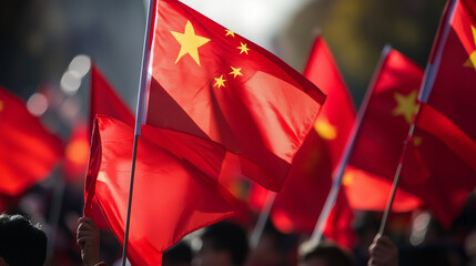 A crowd of people gathered in Beijing holding Chinese flags.
