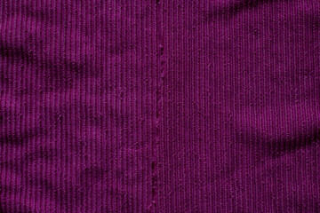 Deep purple fabric showcasing rich texture in a contemporary design environment