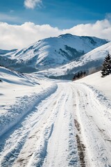 Snowy Mountain Road Winding Through Winter Landscape