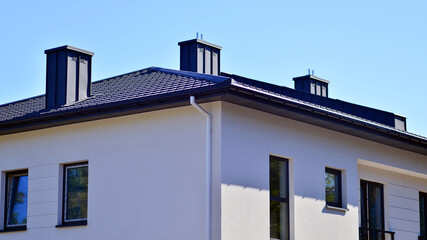Newly built terraced houses in a residential area. Modern terraced houses on the outskirts of the city.