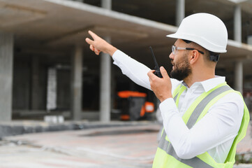 Foreman directing construction site operations