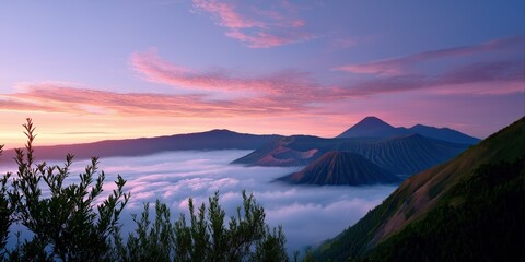 Majestic sunrise over mount bromo with colorful clouds and misty valleys