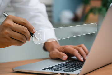 Businessman using smartphone with laptop searching browsing internet data Information networking from website