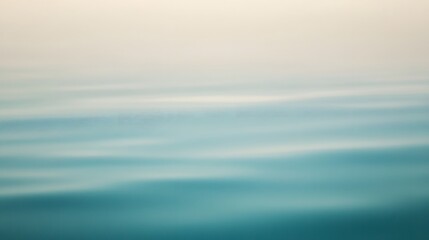 Fototapeta premium Serene ocean waves create abstract horizontal stripes of blue and white.