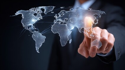 Person in suit interacts with a digital, glowing world map. Connections radiate outward