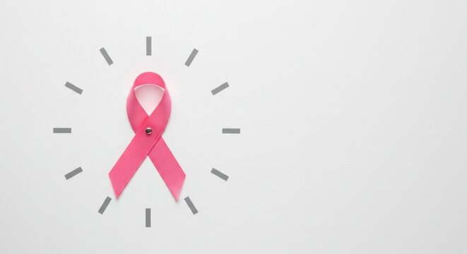 Pink ribbon centered on a minimal clock face, emphasizing the urgency of breast cancer screening and awareness