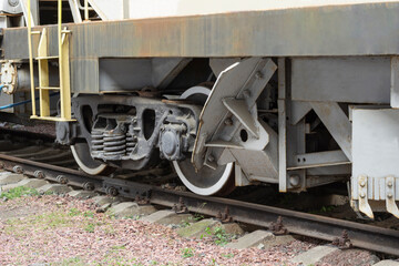 A wagon wheel pair on railway rails. Close-up