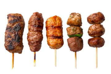 A selection of grilled skewered meats featuring various types, cooked to perfection on wooden sticks. Ideal for culinary presentations.