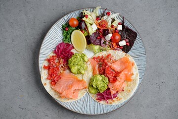 Gourmet Smoked Salmon Tacos with Guacamole and Fresh Side Salad