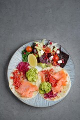 Gourmet Smoked Salmon Tacos with Guacamole and Fresh Side Salad