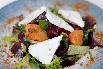 Salad with cheese and fresh vegetables isolated on white background. Greek salad.
