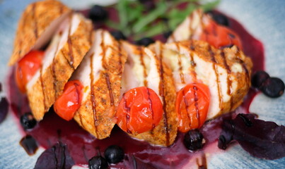 Grilled chicken tomatoes fillet with salad. Healthy food, keto diet, diet lunch concept. Top view on white background.