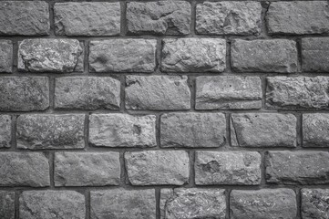 Obraz premium Gray stone wall close-up texture background