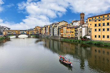Medieval Florence showcases its stunning architecture with colorful buildings lining the Arno...