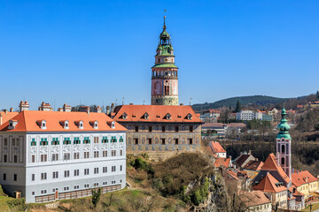 Obraz premium Charming castle and historic architecture under clear blue sky, Cesky Krumlov in Czech Republic