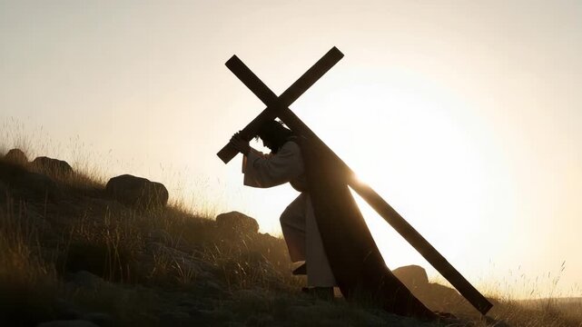 Silhouette carries cross on hill at sunset, representing religious faith. Carries cross is powerful symbol, expressing sacrifice and devotion in silhouette.