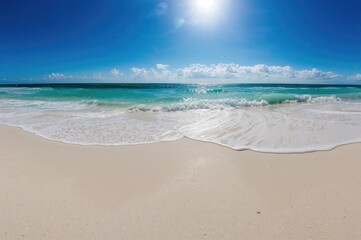 Fototapeta premium Gentle waves caressed the shoreline as a cool sea breeze brought a fresh scent. The radiant sun warmed the skin while sparkling white sand shimmered.