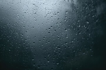 Drops of rain and reflections on glass