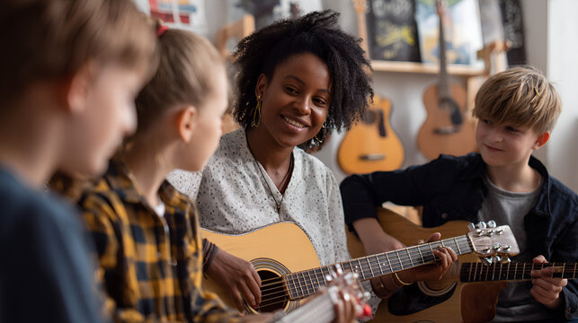 Teacher  kids playing guitars in music room guitars in the background - Powered by Adobe