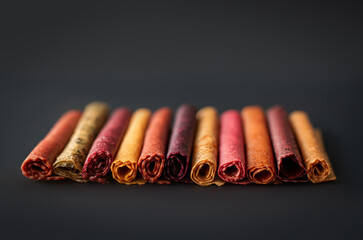 composition of fruit pastille on a dark background
