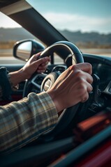 man driving car on the road