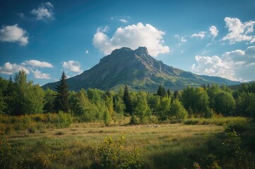 Naklejka premium Scenic View of a Lush Green Mountain Landscape