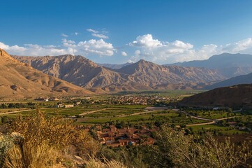 Fototapeta premium Stunning vistas await in the Al Haouz region of the High Atlas Mountains.