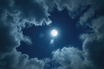 Beautiful nightscape featuring a bright full moon and drifting clouds under a star-filled sky.