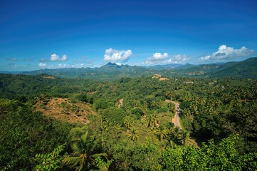 Fototapeta premium Mountain road connecting two coastal towns in the Caribbean