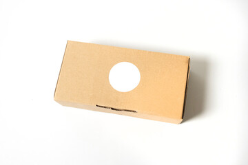 cardboard box with blank label isolated on white background, suitable for brand, cardboard box mockup template
