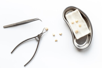 Dental equipment tools for teeth care on white background. Professional Dentist desktop, top view