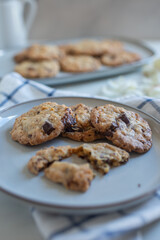 A plate of fresh baked oatmeal and chocolate chip cookies